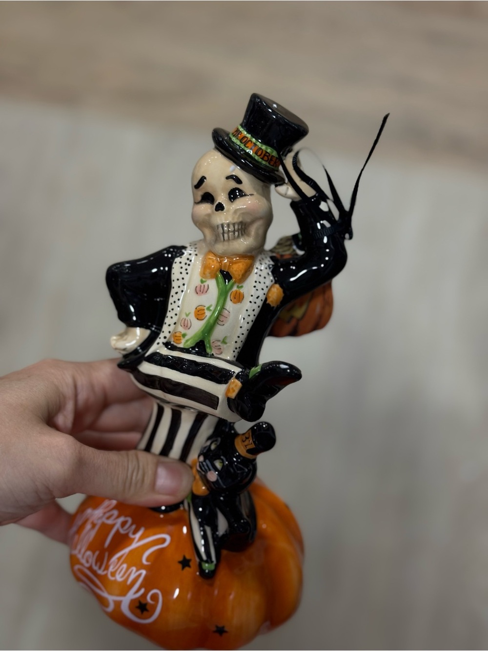 Blue Sky Black & Orange Halloween Skeleton on Pumpkin